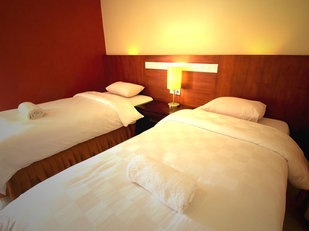 Jesens Inn I Кута Номер фото